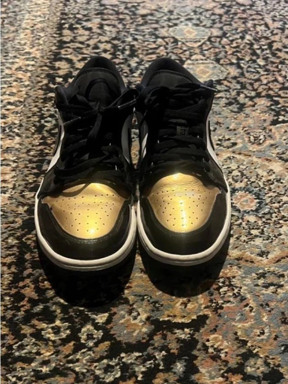 Air Jordan low “Gold Toe” in size 11 men.